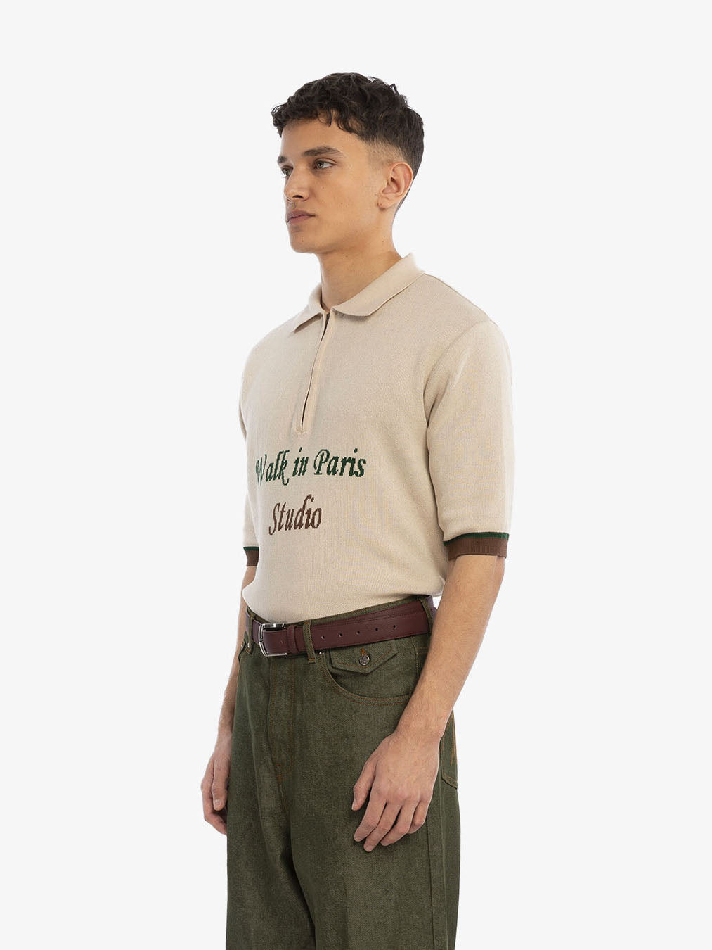 The beige knit polo shirt