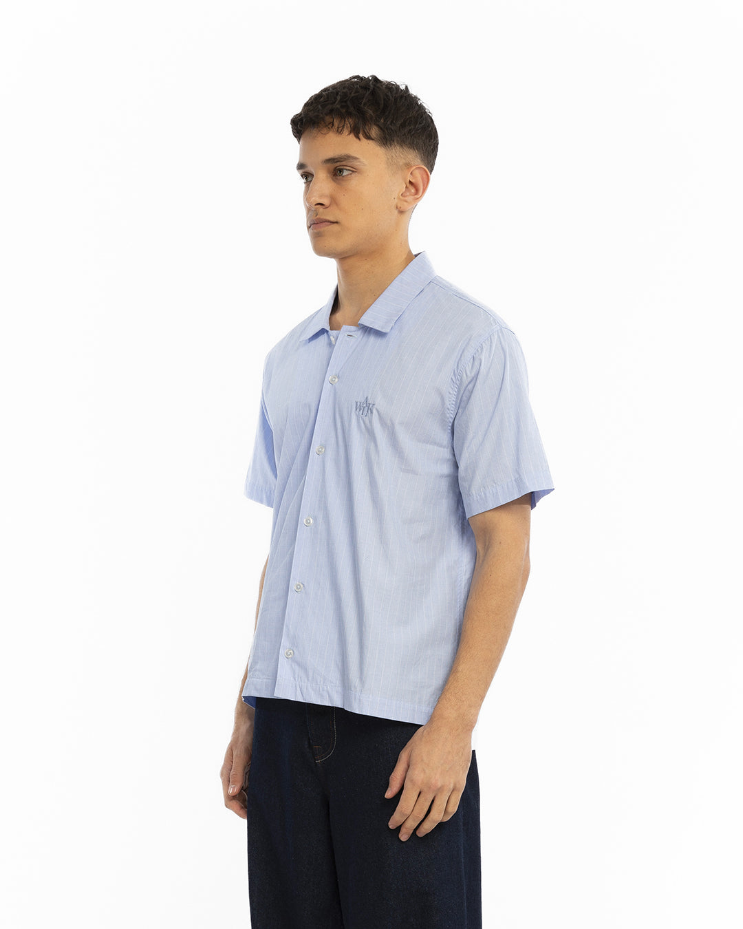 The blue short-sleeved shirt