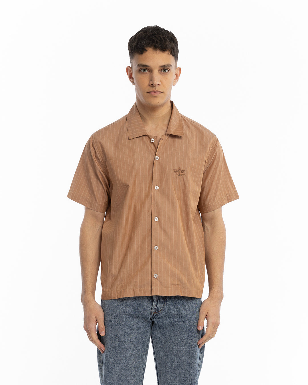 The brown short-sleeved shirt