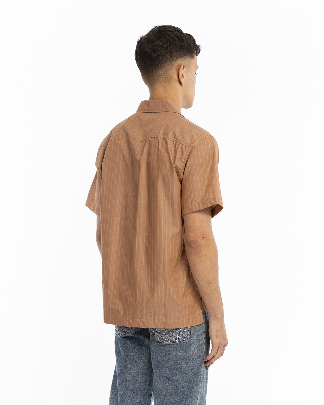 The brown short-sleeved shirt