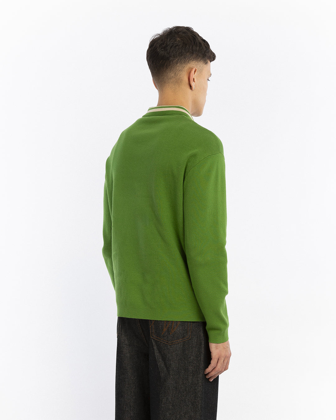 The emerald green knitted cardigan