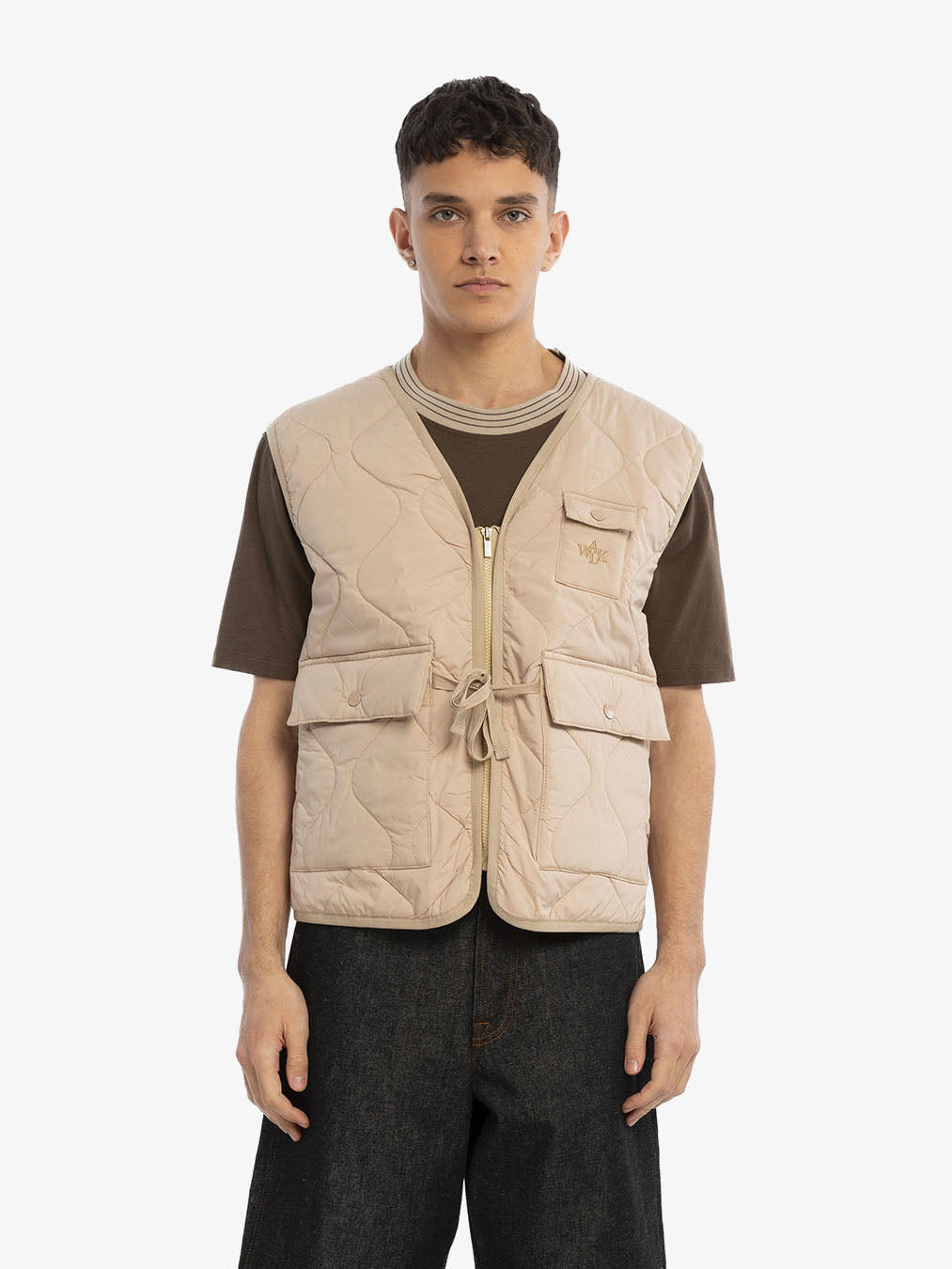 The florist's sleeveless jacket