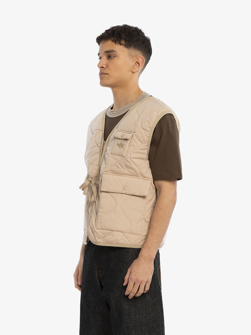The florist's sleeveless jacket
