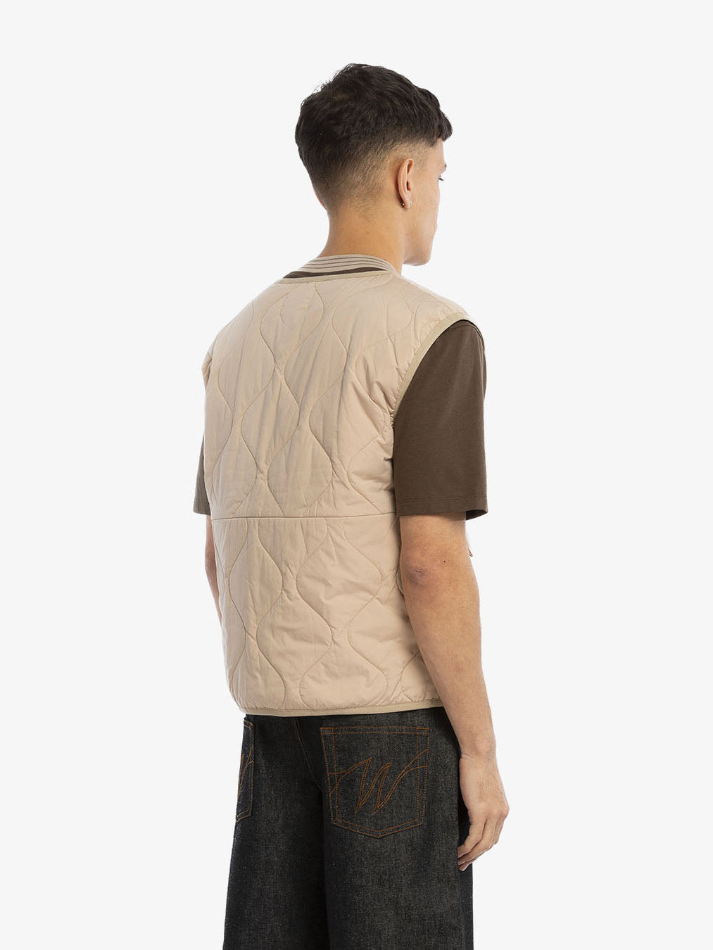 The florist's sleeveless jacket