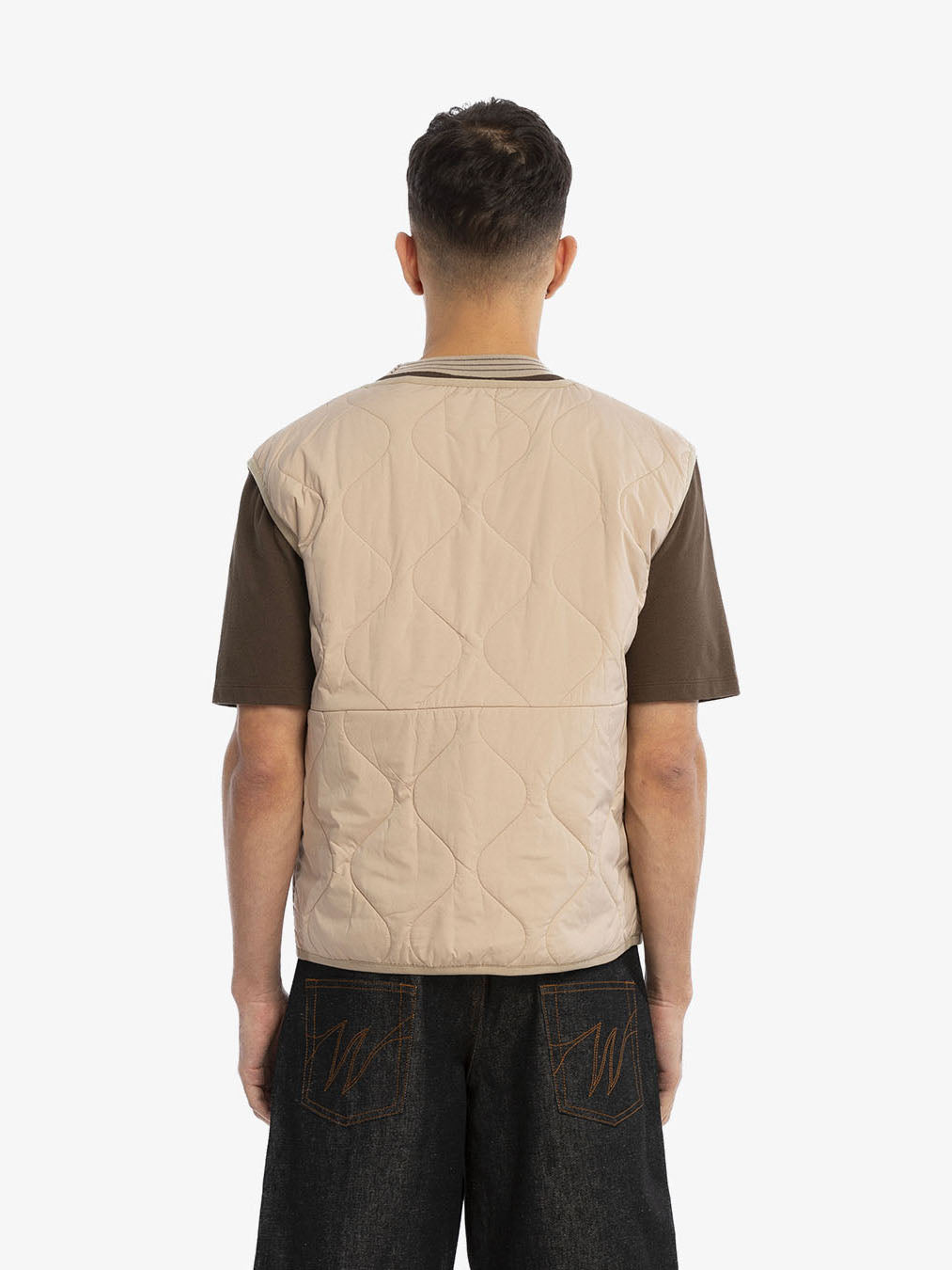 The florist's sleeveless jacket