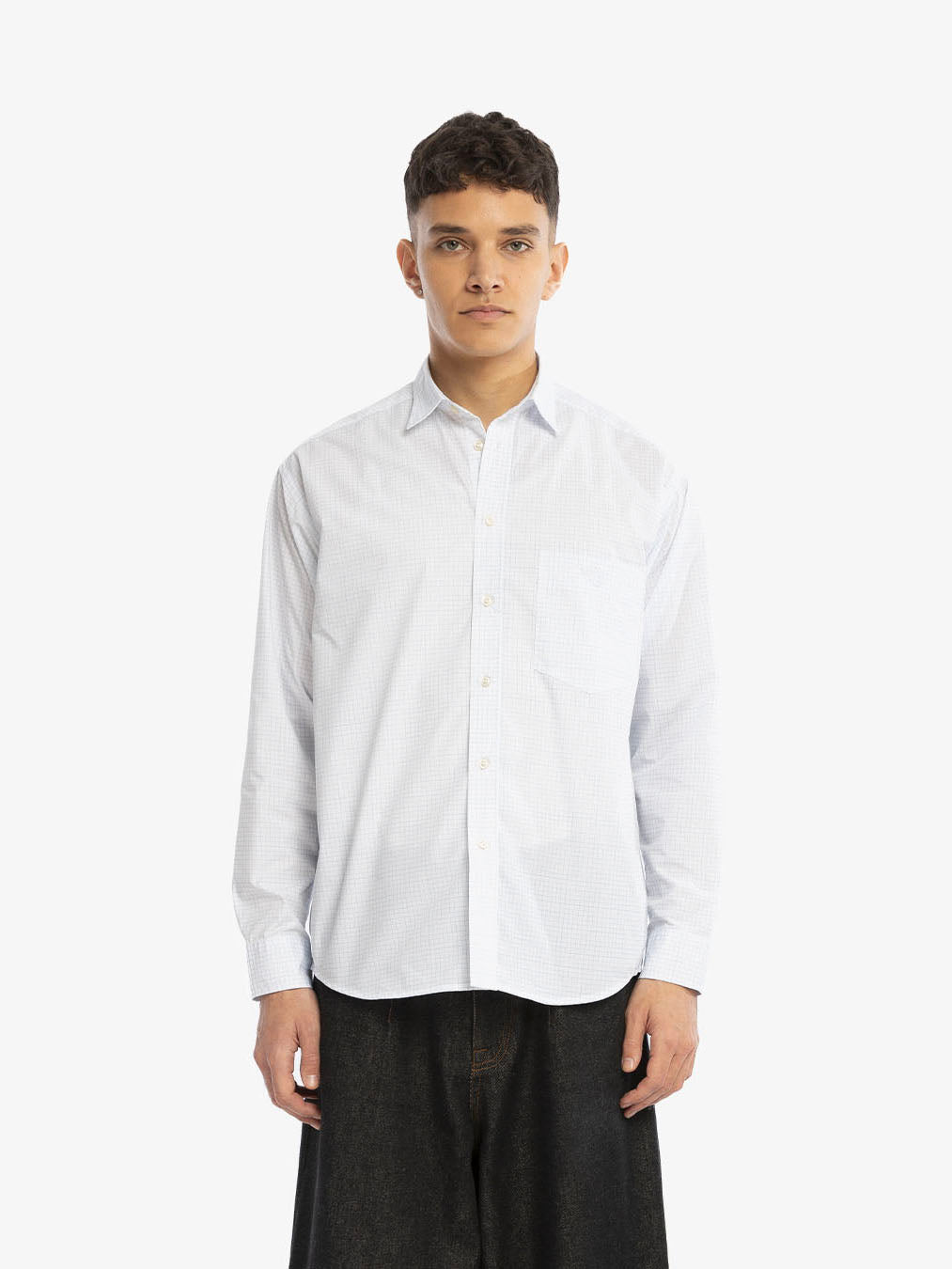 La chemise manches longues à carreaux