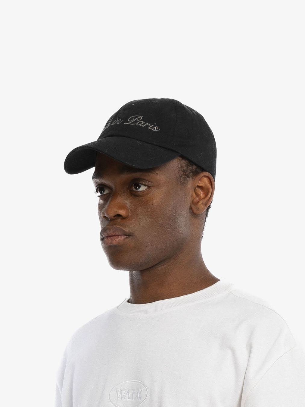 The signature black cap
